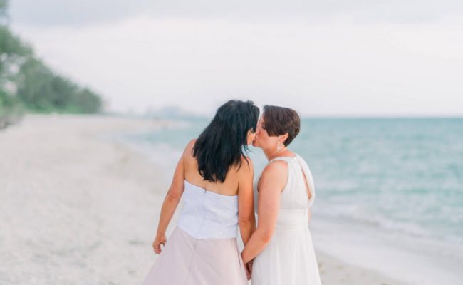 Brides sharing a kiss