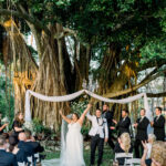 Newly weds ready to walk down the aisle for the first time as Mr. and Mrs. at a private estate in Naples, FL
