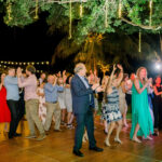 Wedding guests dancing on the dance floor at private estate in Naples, FL
